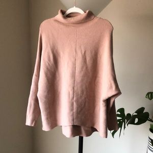 Turtleneck asymmetric sweater